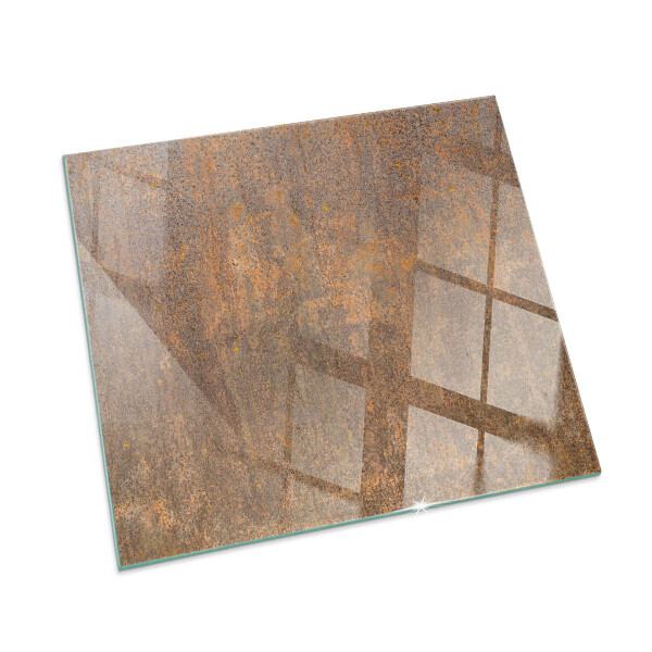Rectangular tempered glass hearth Rust print on metal surface
