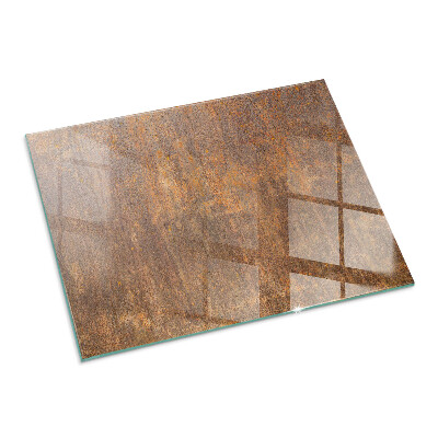 Rectangular tempered glass hearth Rust print on metal surface