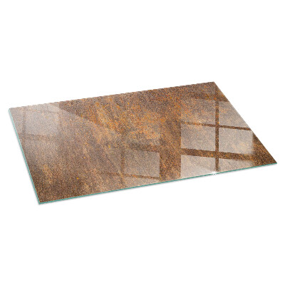 Rectangular tempered glass hearth Rust print on metal surface
