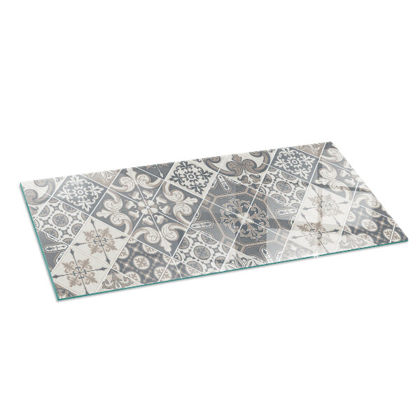 Rectangular glass hearth for wood stove Arrangement of mosaic decorations