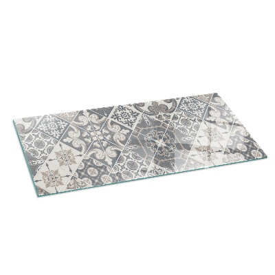 Rectangular glass hearth for wood stove Arrangement of mosaic decorations
