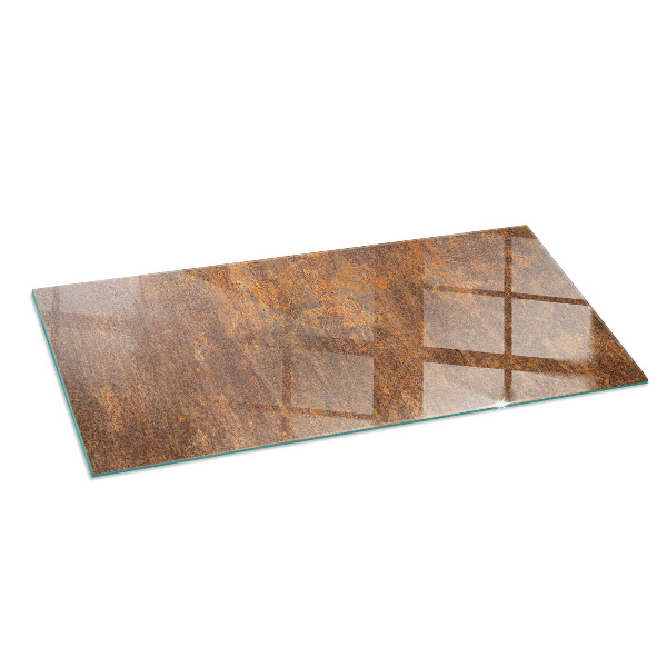 Rectangular tempered glass hearth Rusty pattern on the background