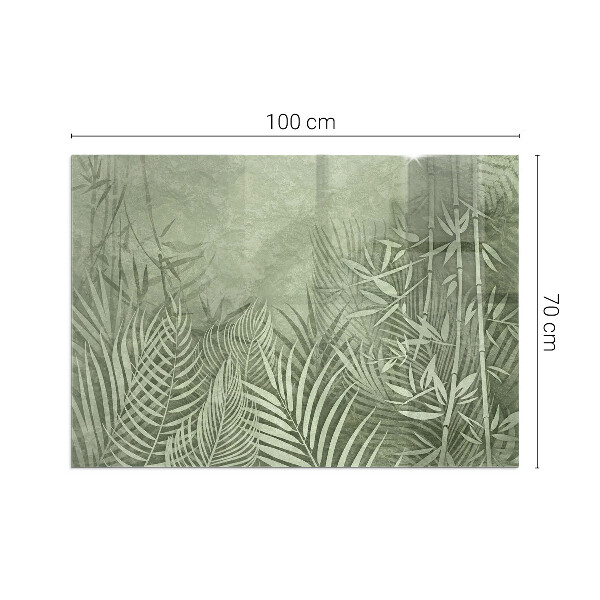 Rectangular glass hearth Tropical leaves on the background