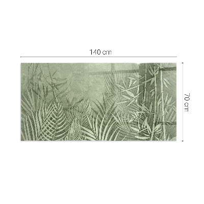 Rectangular glass hearth Tropical leaves on the background