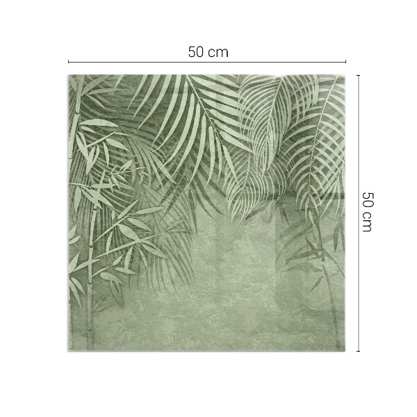 Rectangular glass hearth Tropical leaves on the background