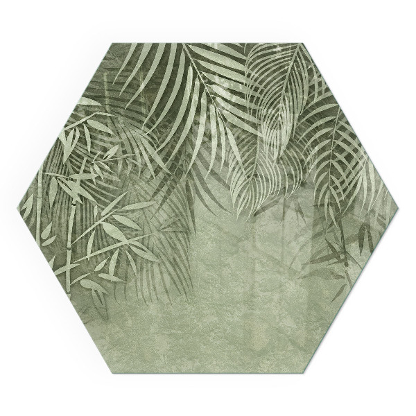 Hexagonal glass hearth Tropical leaves on the background