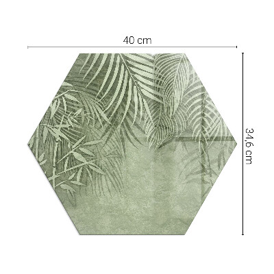 Hexagonal glass hearth Tropical leaves on the background