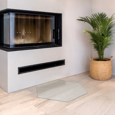 Hexagonal hearth pad for fireplace with an icy visual effect