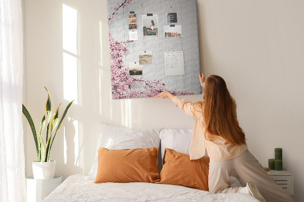 Memo cork board Floral branches on a light background