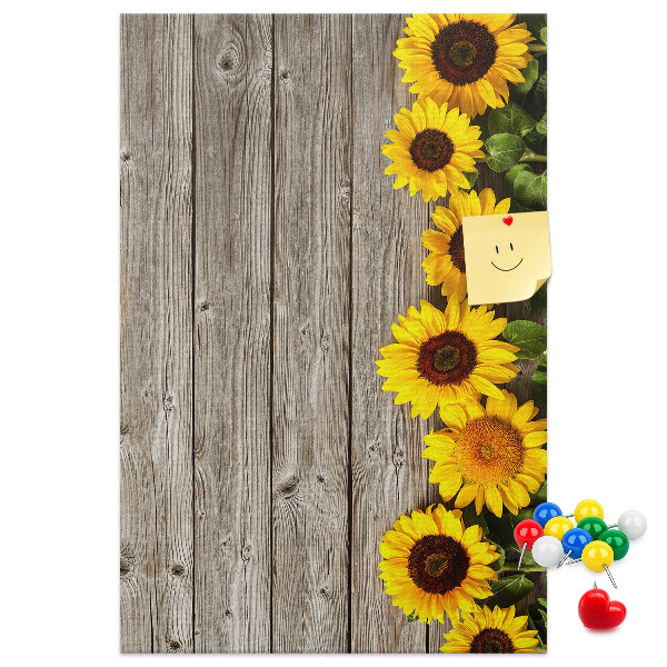 Cork notice board Sunflowers on a wooden board background