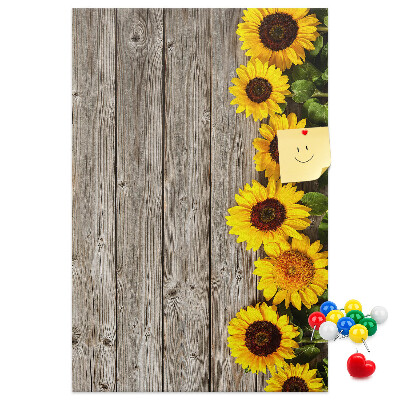 Cork notice board Sunflowers on a wooden board background