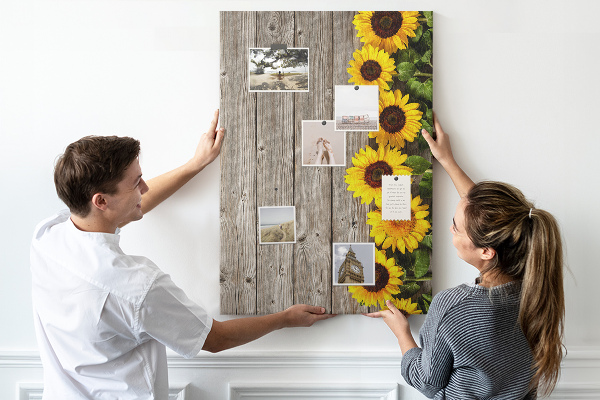 Cork notice board Sunflowers on a wooden board background