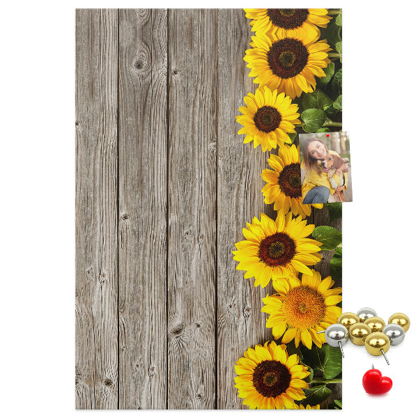 Cork notice board Sunflowers on a wooden board background
