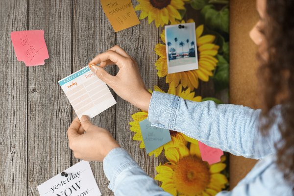 Cork notice board Sunflowers on a wooden board background