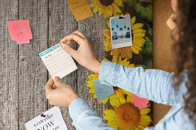 Cork notice board Sunflowers on a wooden board background