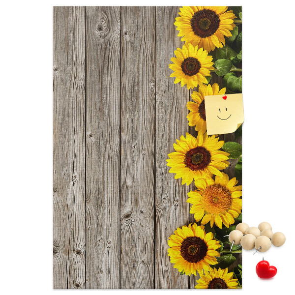 Cork notice board Sunflowers on a wooden board background
