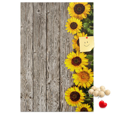 Cork notice board Sunflowers on a wooden board background