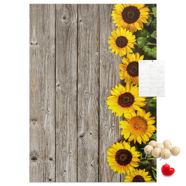 Cork notice board Sunflowers on a wooden board background