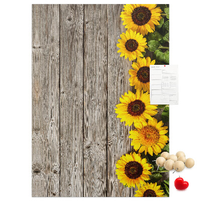 Cork notice board Sunflowers on a wooden board background