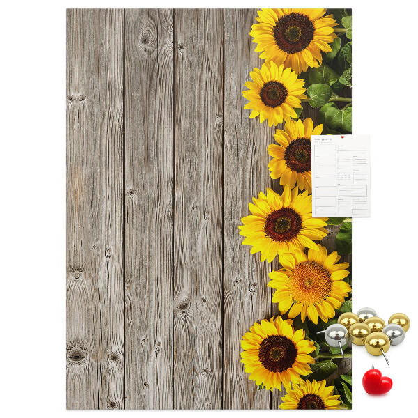 Cork notice board Sunflowers on a wooden board background