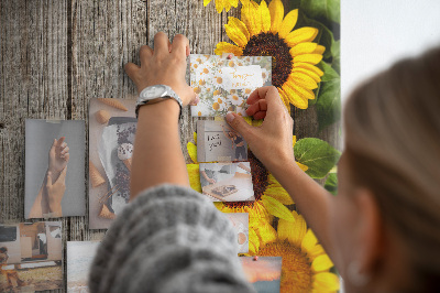 Cork notice board Sunflowers on a wooden board background