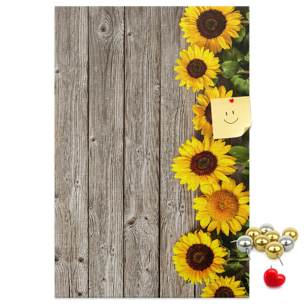 Cork notice board Sunflowers on a wooden board background