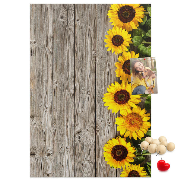 Cork notice board Sunflowers on a wooden board background