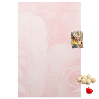 Wall cork memo board Delicate pink roses on the background.