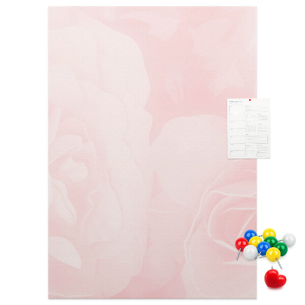 Wall cork memo board Delicate pink roses on the background.