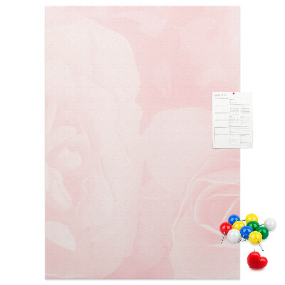 Wall cork memo board Delicate pink roses on the background.