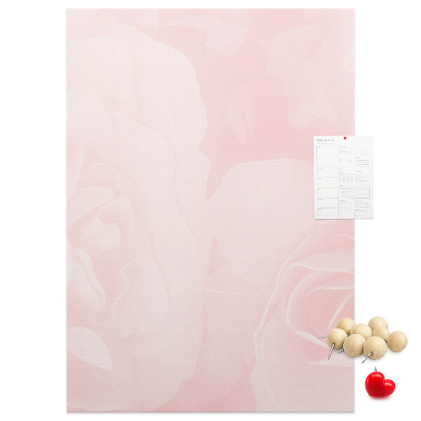 Wall cork memo board Delicate pink roses on the background.