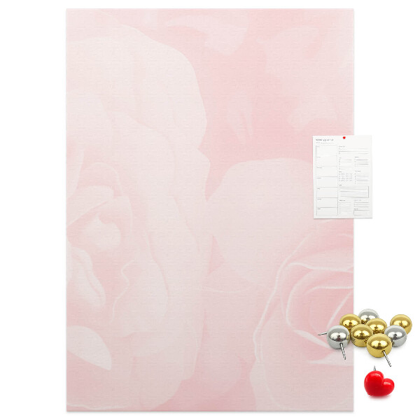 Wall cork memo board Delicate pink roses on the background.