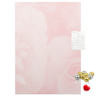 Wall cork memo board Delicate pink roses on the background.