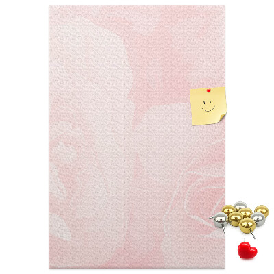 Wall cork memo board Delicate pink roses on the background.