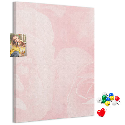 Wall cork memo board Delicate pink roses on the background.