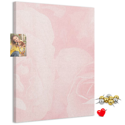 Wall cork memo board Delicate pink roses on the background.