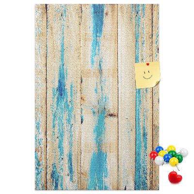 Cork notice board Old wooden panel with blue accents