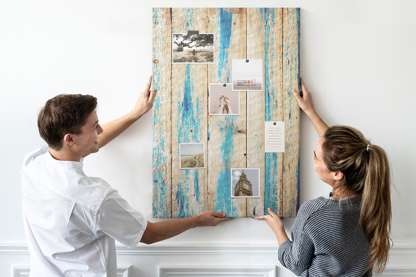 Cork notice board Old wooden panel with blue accents