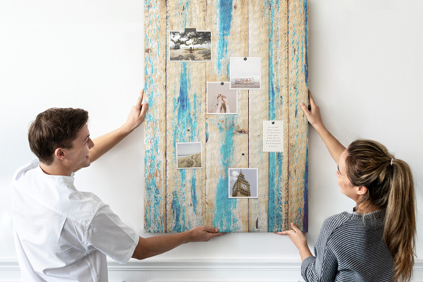 Cork notice board Old wooden panel with blue accents