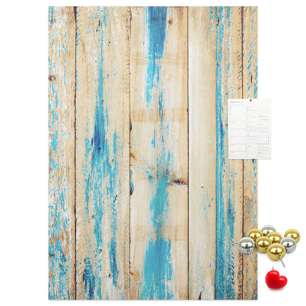 Cork notice board Old wooden panel with blue accents