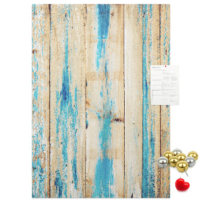 Cork notice board Old wooden panel with blue accents