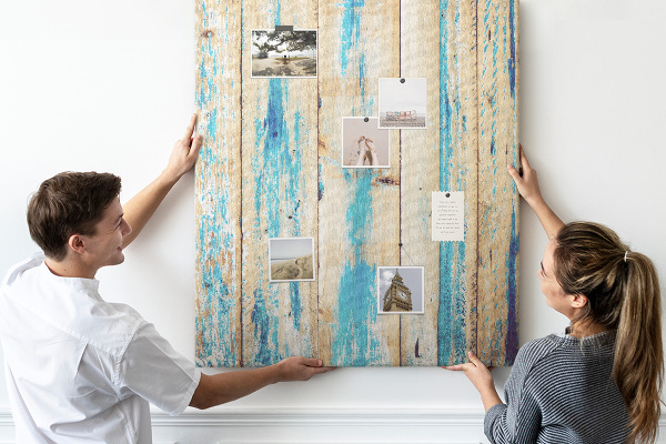 Cork notice board Old wooden panel with blue accents