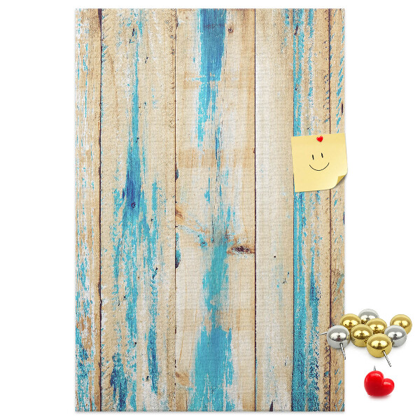 Cork notice board Old wooden panel with blue accents