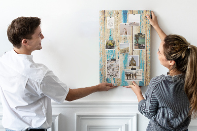 Cork notice board Old wooden panel with blue accents