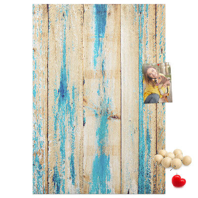 Cork notice board Old wooden panel with blue accents