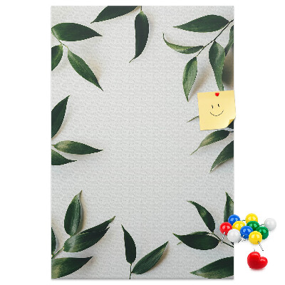Wall cork memo board Green leaves on a light background