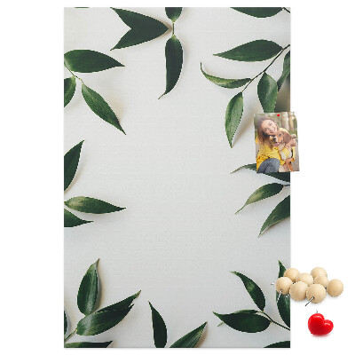 Wall cork memo board Green leaves on a light background