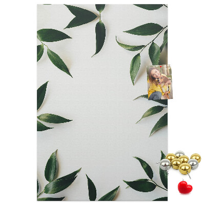 Wall cork memo board Green leaves on a light background