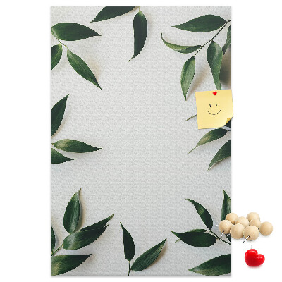 Wall cork memo board Green leaves on a light background