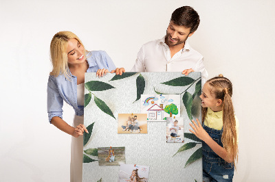 Wall cork memo board Green leaves on a light background